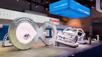 Bosch connected mobility exhibition stand displaying hydrogen fuel-cell truck chassis